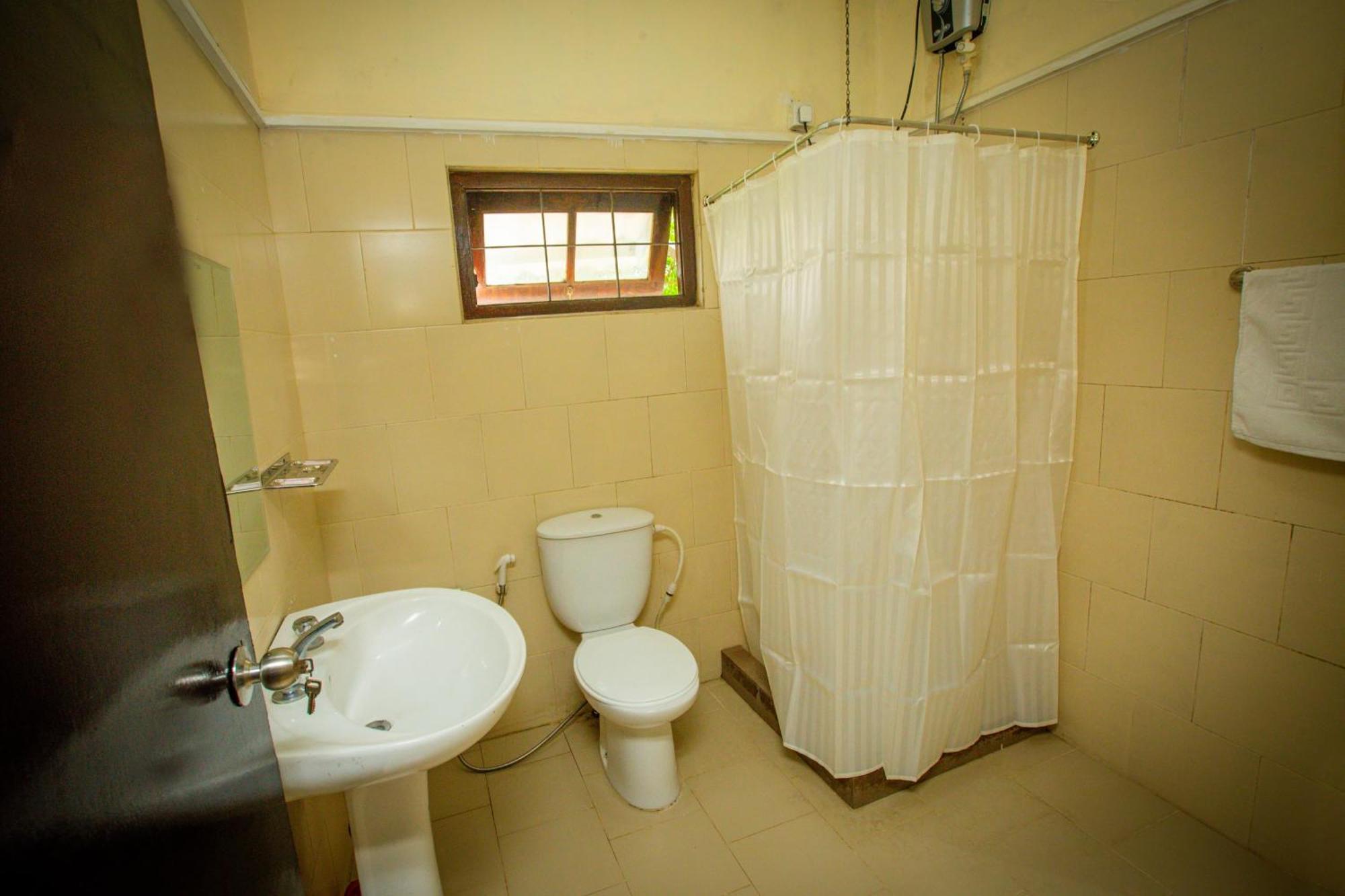 Sunbloom Inn Канди Экстерьер фото